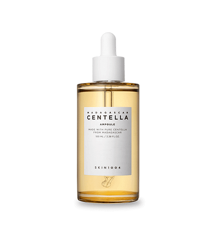 A bottle of SKIN1004 Madagascar Centella Ampoule surrounded by lush greenery.