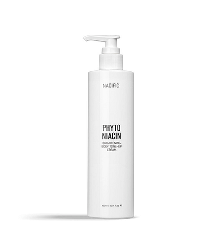 NACIFIC Phyto Niacin Brightening Body Tone-Up Cream tube with fresh leaves and white flowers.