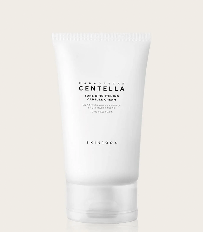 Tube Of SKIN1004 Madagascar Centella Tone Brightening Capsule Cream surrounded in plain background